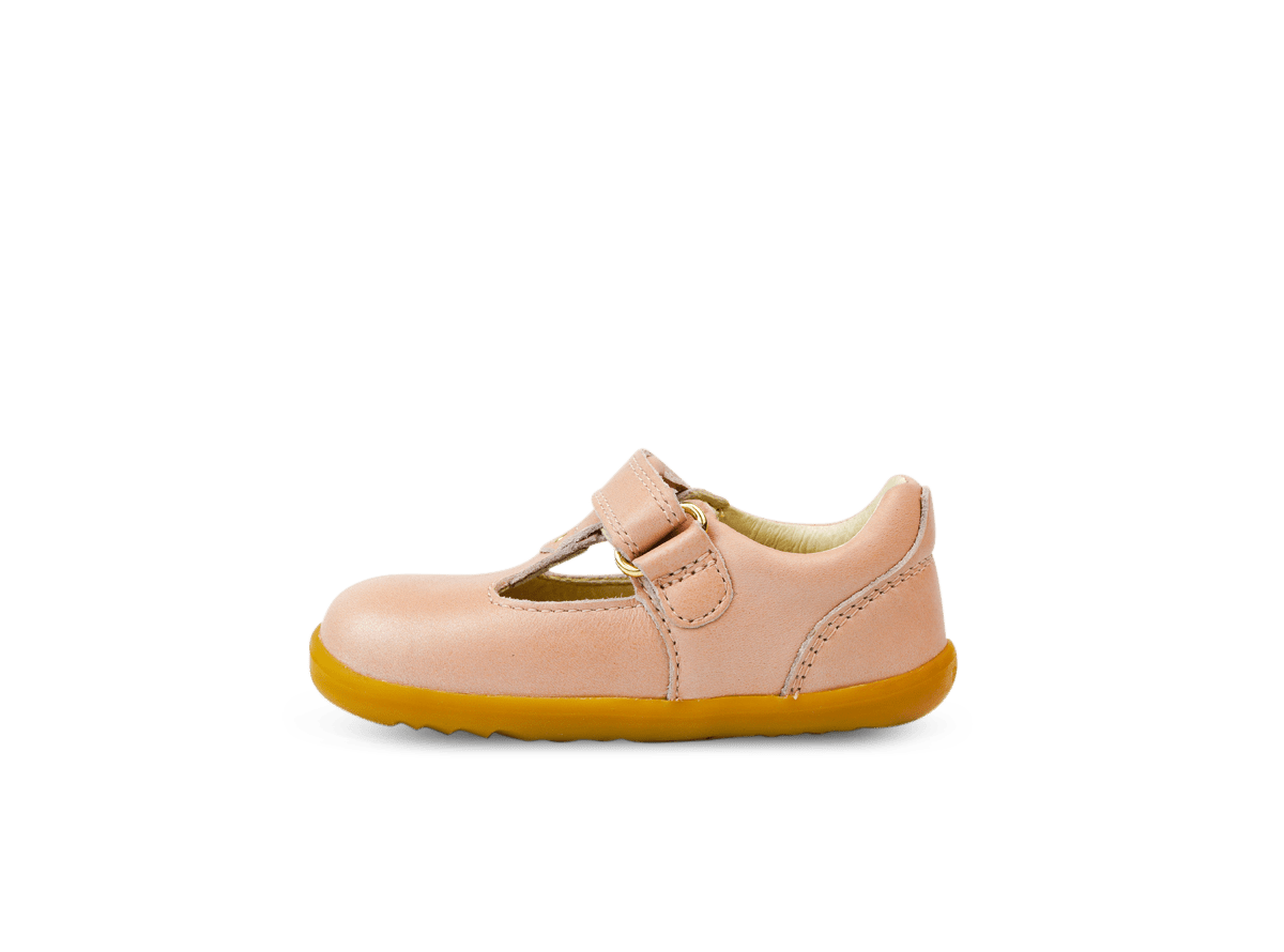 Single pink bobux Louise dusk pearl children's shoe with brown soles on a white background