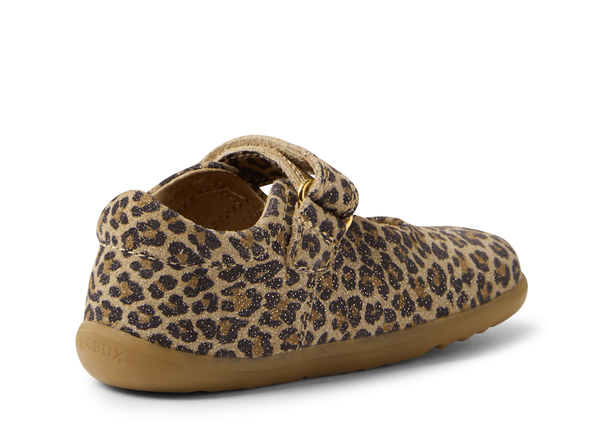 Leopard print shoe with brown sole on a white background