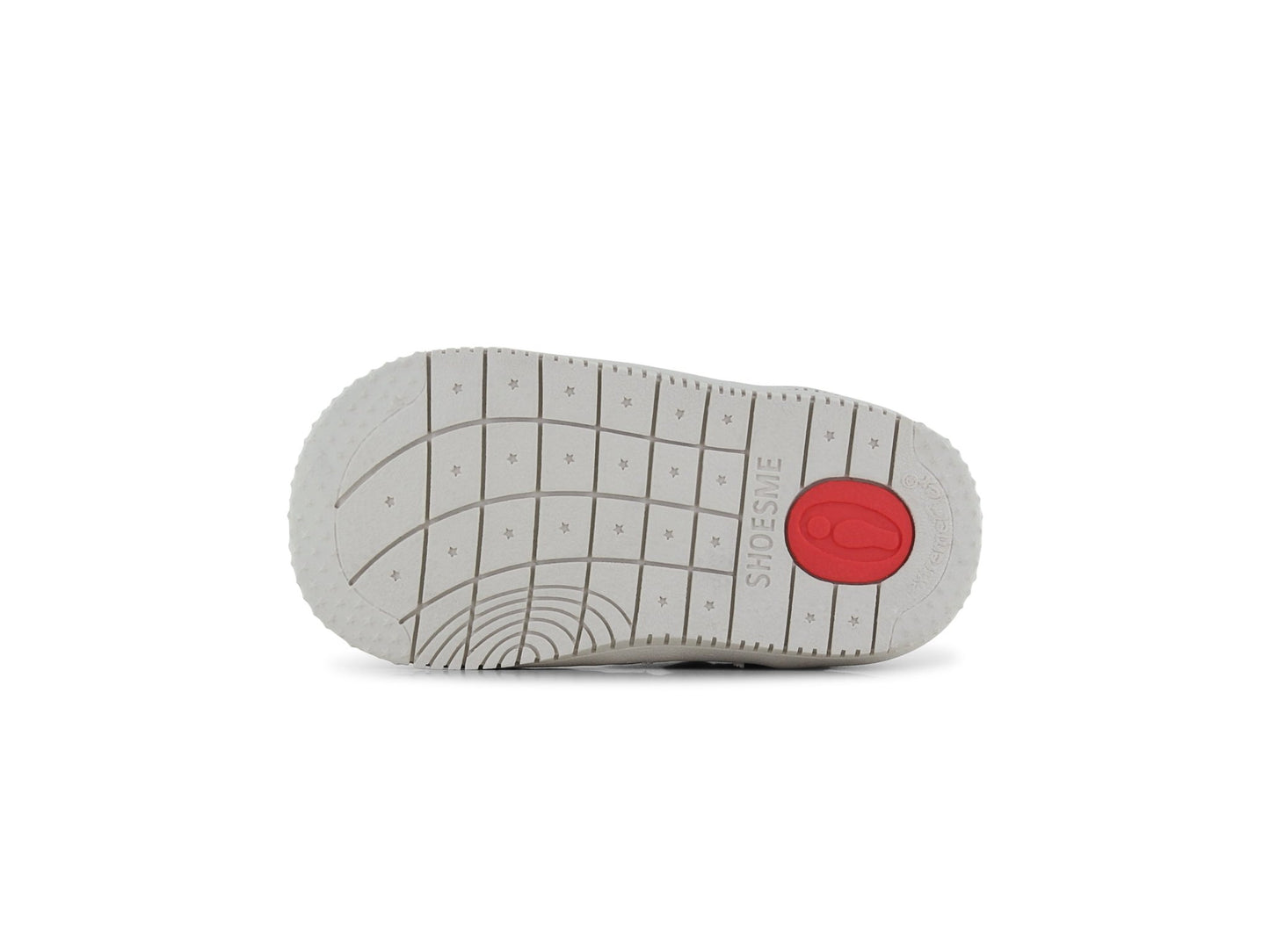 Gray shoe sole with red circle and text on a white background