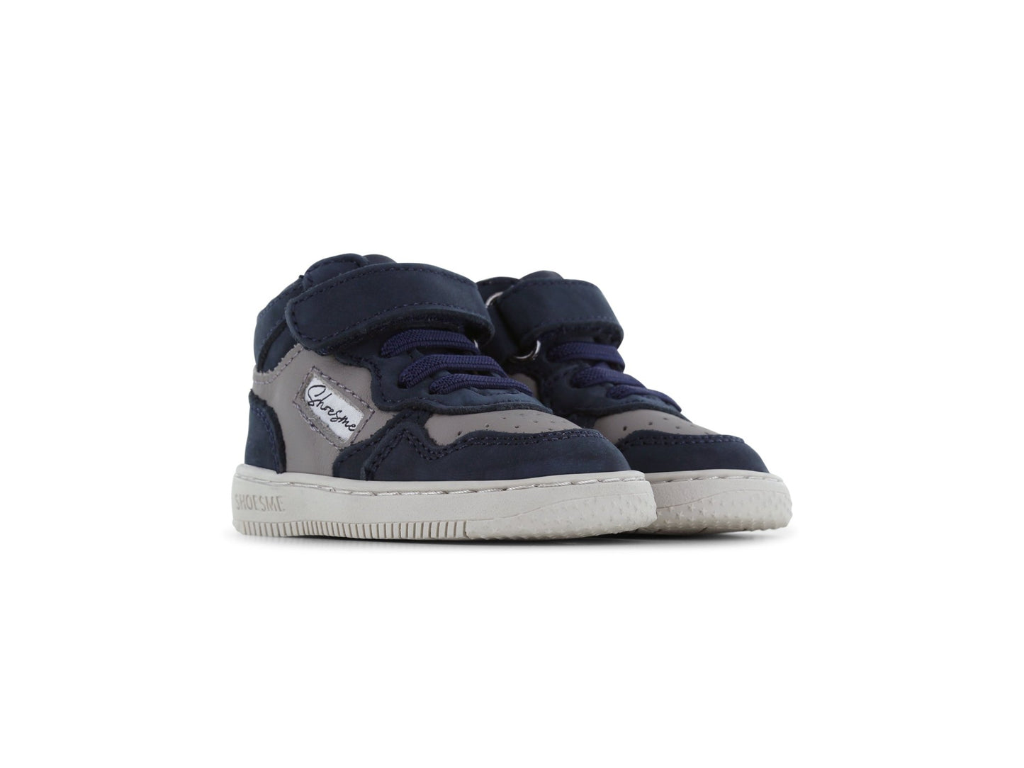 Pair of navy blue and gray sneakers with velcro straps on a white background