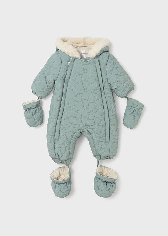 Quilted baby snowsuit with matching mittens and booties on a light gray background