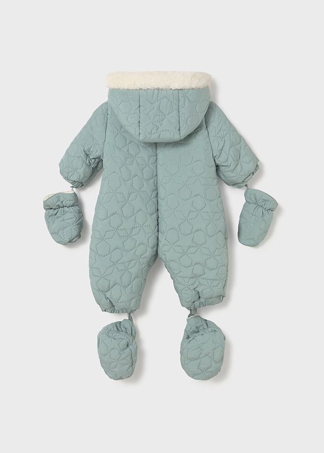 Quilted baby snowsuit with mittens and booties on a light gray background