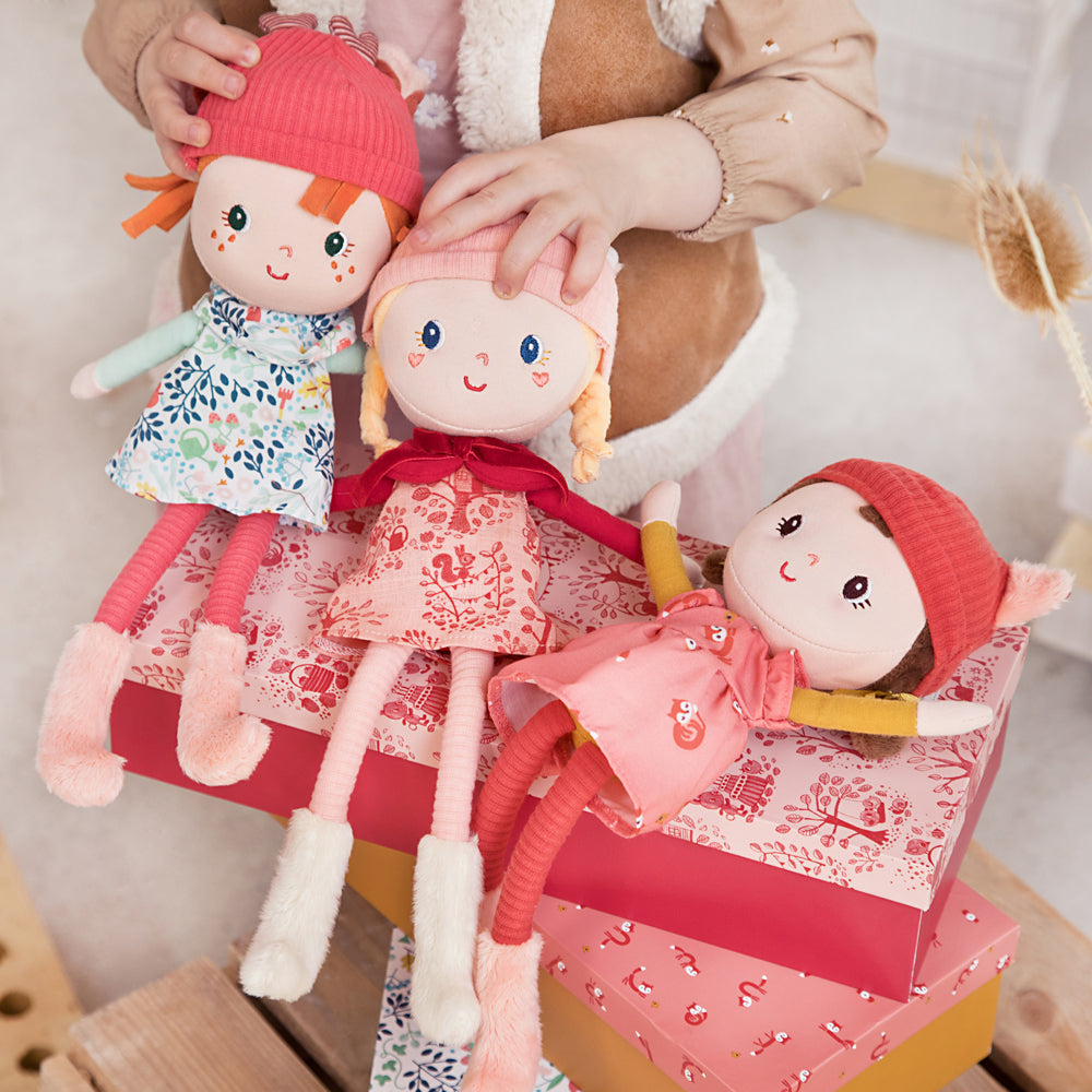 Lilliputiens Lena soft fabric doll with blonde braids, unicorn‑horn hat, forest dress and matching gift box. Little Bigheads.