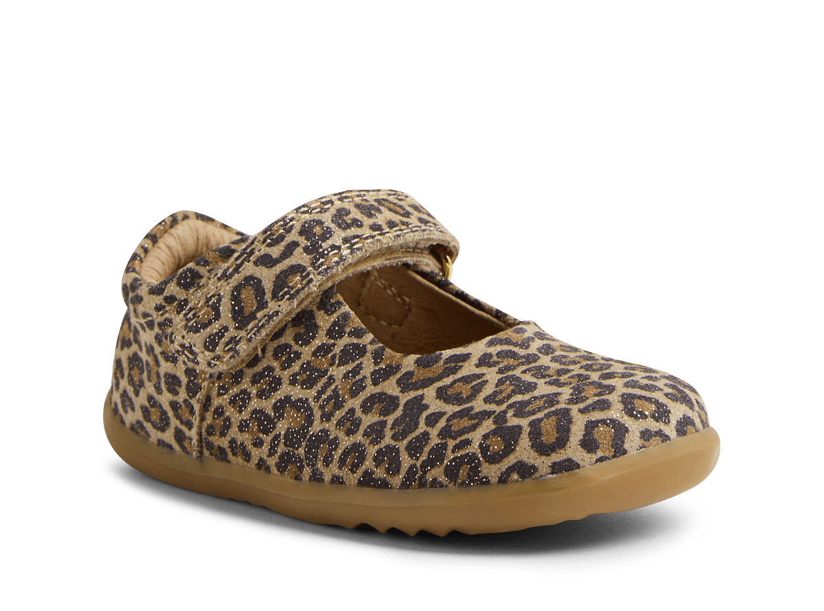 Leopard print shoe with a brown sole on a white background