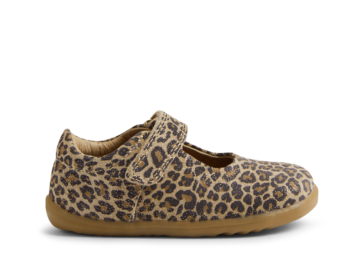 Leopard print shoe with a brown sole on a white background