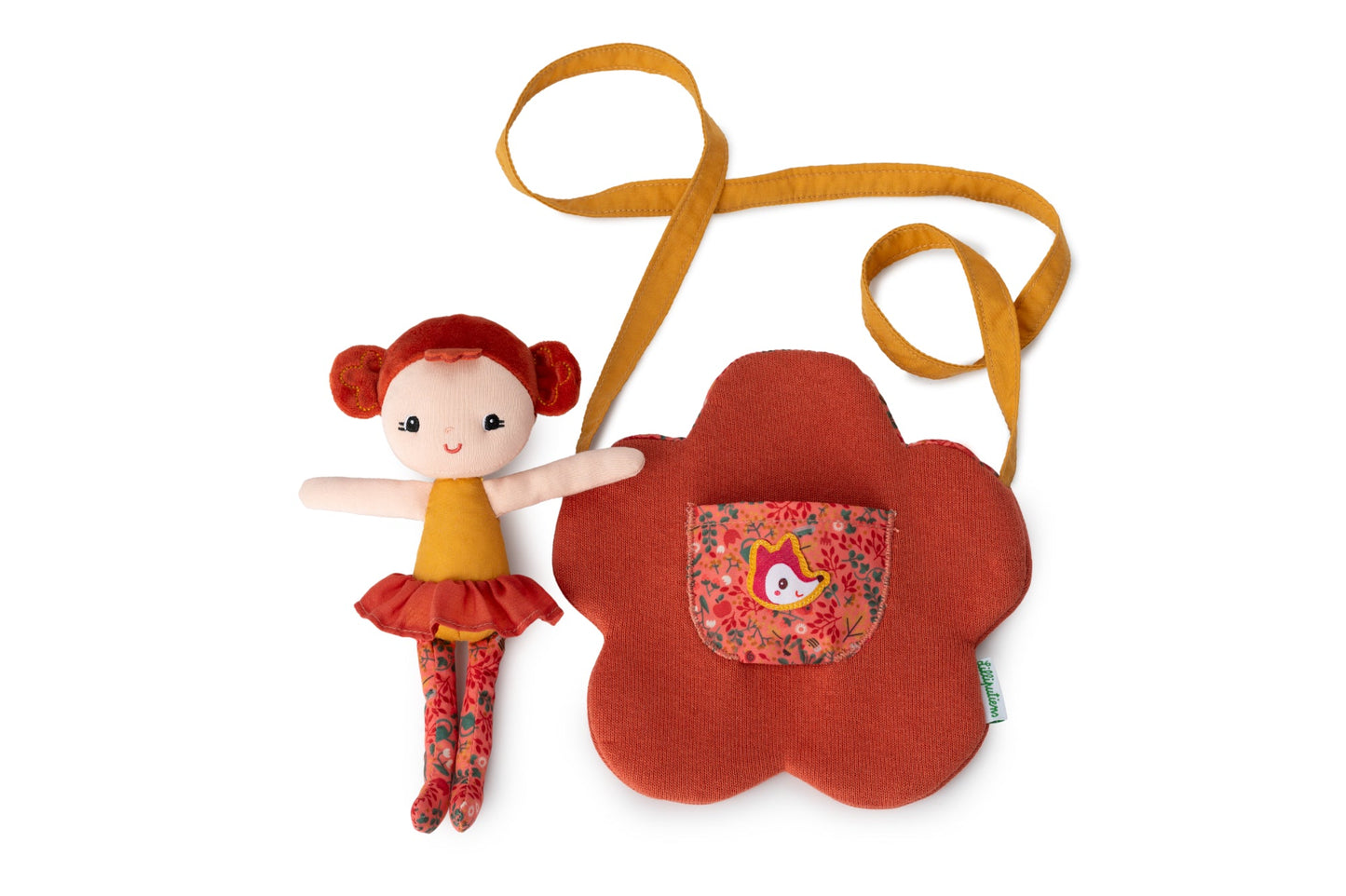 Adele soft fabric doll with red hair, floral leggings and matching flower‑shaped bag.