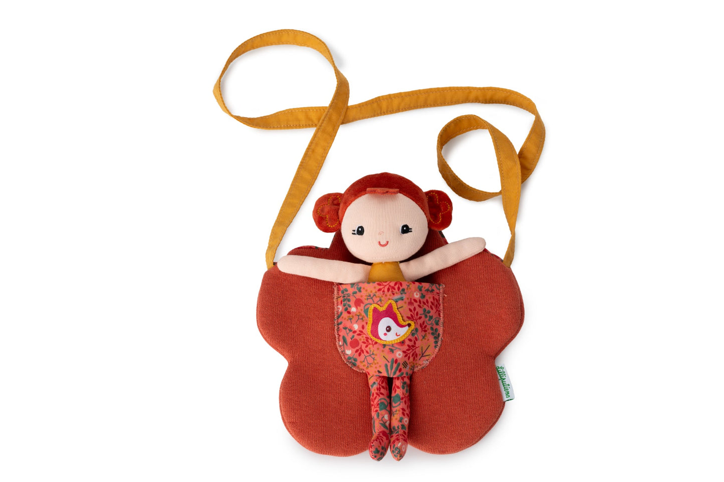 Adele soft fabric doll with red hair, floral leggings and matching flower‑shaped bag.