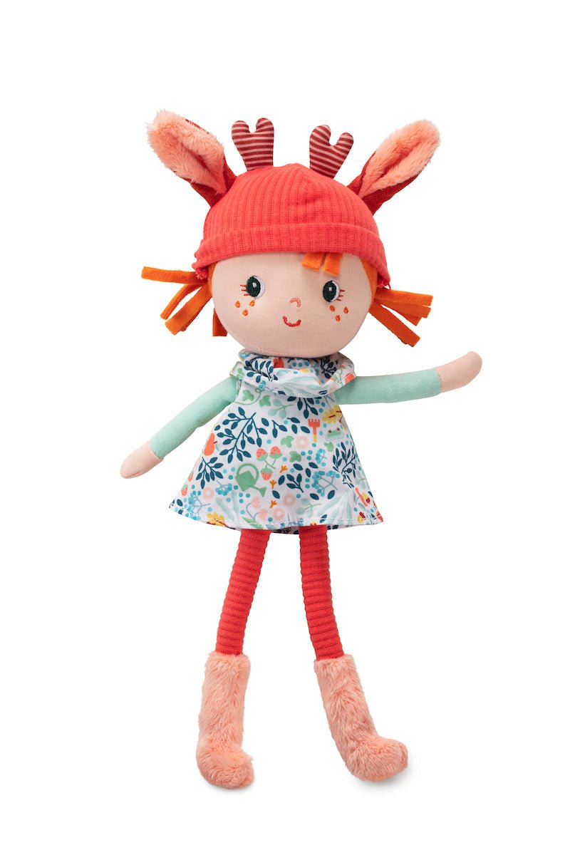 Lilliputiens Stella soft fabric doll with red hair, floral dress, fawn‑ear hat and decorative gift box.