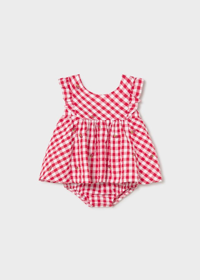 Red gingham baby dress with ruffled sleeves, embroidered strawberries, and matching bloomers.