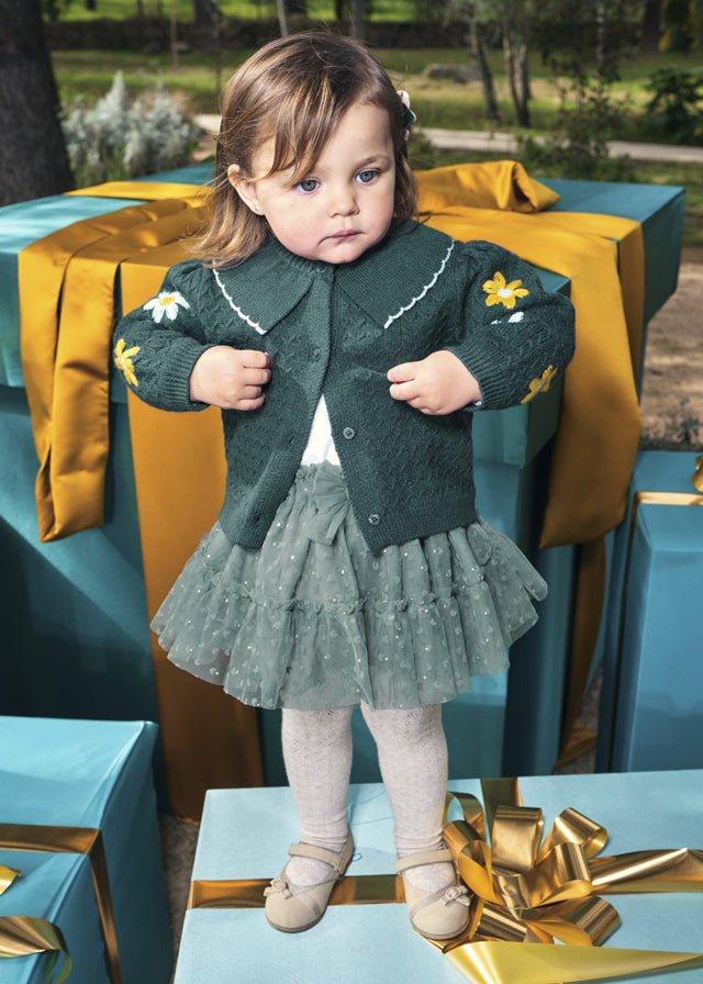 Bayleaf green tulle skirt with layered shimmer and heart detailing.

