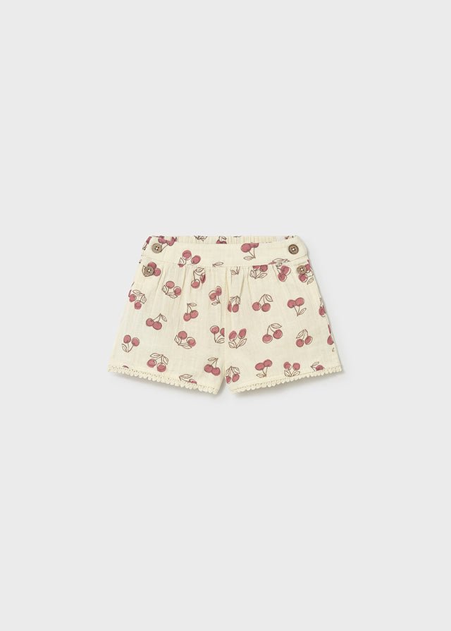 Mayoral Cherry print beige cotton shorts with decorative button design to the stretch waist band. 