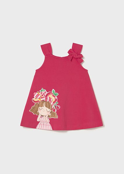 Pink dress with a character design and bow detail to one strap on a white background
