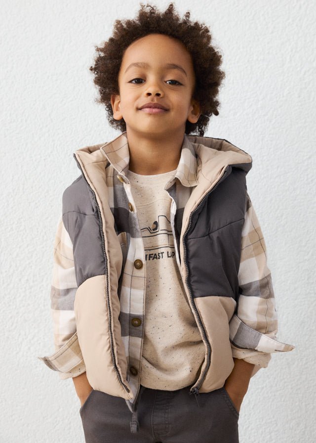 Hazelnut reversible boys’ vest with lightweight padding.