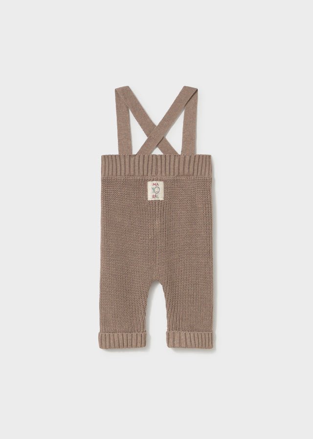 Mayoral baby knit suspenders pants in soft Khaki Opalo — soft cotton trousers with cross‑over straps and button detail.