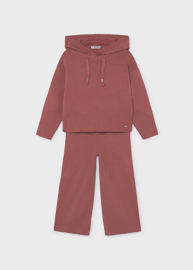 A two-piece children's knit set in a dusty rose color, featuring a hooded sweatshirt with drawstrings and matching wide-leg pants, laid flat against a light gray background.