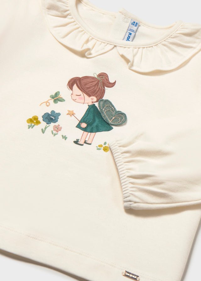 Baby Girl crudo long sleeve shirt dress with fairy illustration, ruffled collar and elastic cuffs.