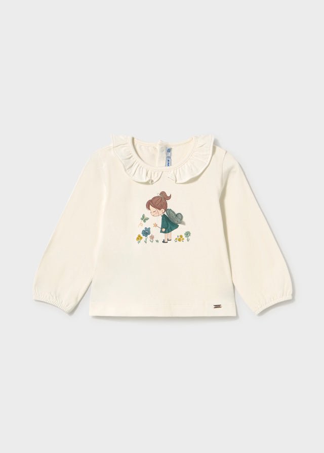Baby Girl crudo long sleeve shirt dress with fairy illustration, ruffled collar and elastic cuffs.