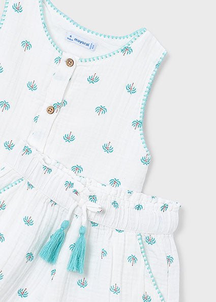 Mayoral Mini girls’ palm‑print summer set with sleeveless top, wooden buttons, tassels and matching shorts.