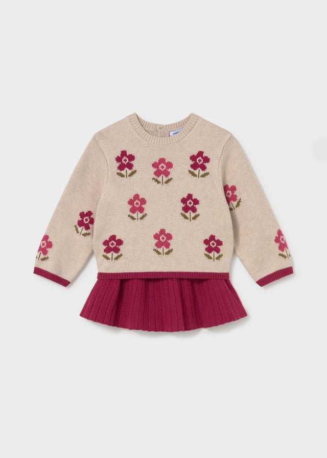 Raspberry knit skirt and floral knit sweater set for baby girl.


