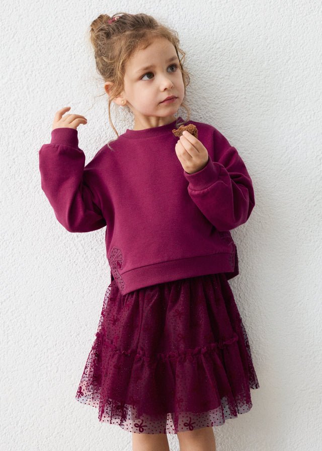Raspberry two‑piece set with long‑sleeve pullover and layered dotted tulle skirt, Style 16‑04934‑060.