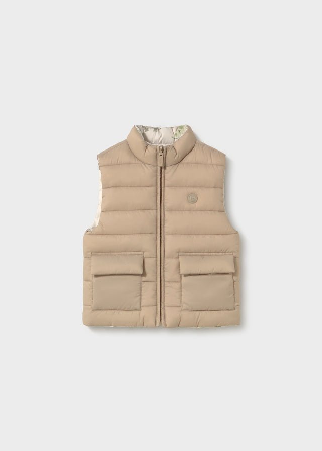 Baby Boy reversible gilet with neutral side and soft dinosaur print on the reverse.