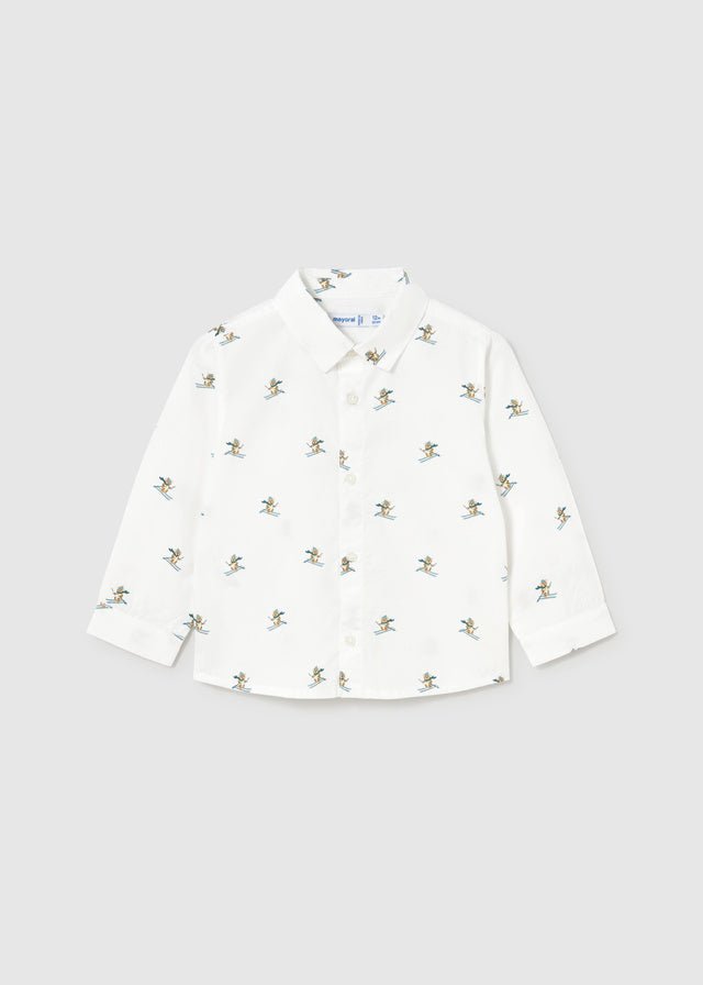 Baby Boy white long sleeve buttondown shirt with skier print and collar.