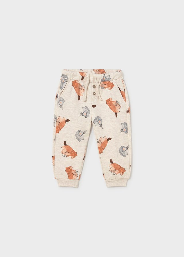  Light Tofu baby trousers with a subtle woodland print and long‑leg design.