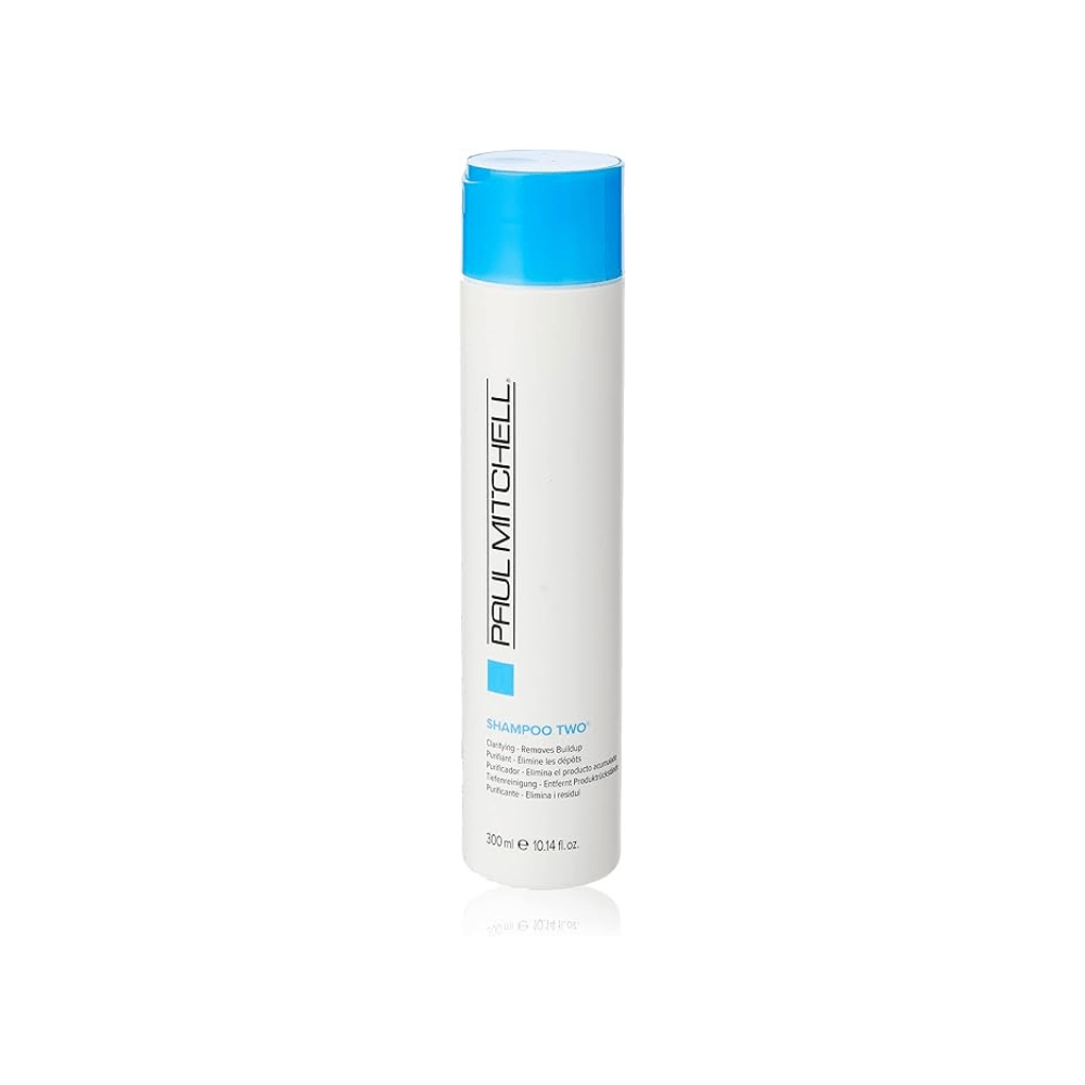 White bottle with blue cap on a white background