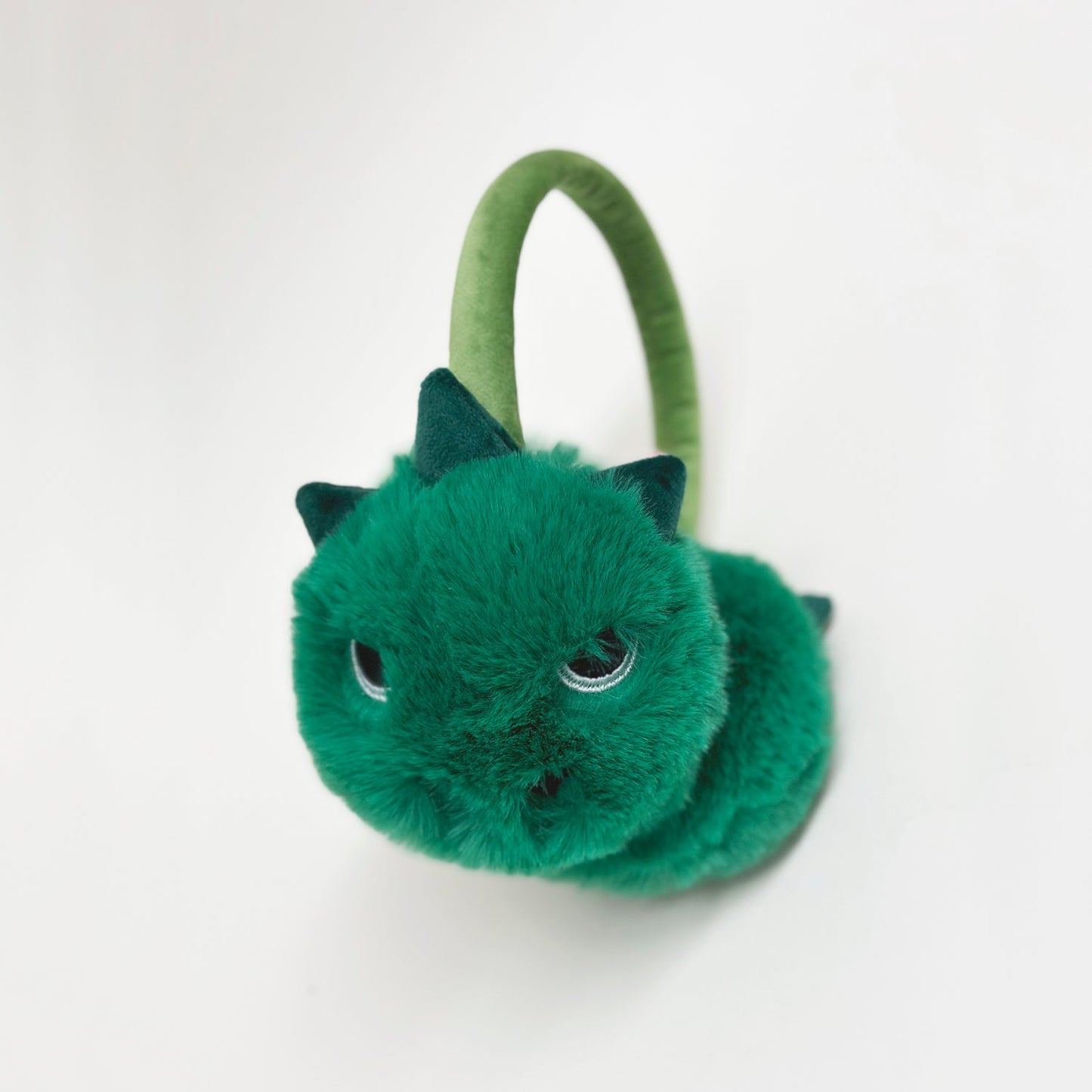 Rockahula t-rex earmuff, green with dino face ears with soft plush spikes