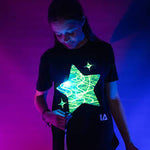 Illuminated apparel - glow in the dark interactive t-shirt star design